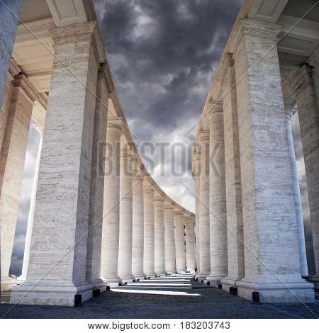 White stone columns against the sky. The Colonnade in Rome