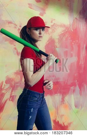 Pretty Girl In Red Cap With Green Bat