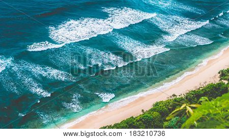 Aerial view of Nunggalan Beach near Uluwatu, Bali, Indonesia.