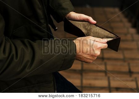 Man Hands Open Checking Empty Wallet Broke Out of Cash