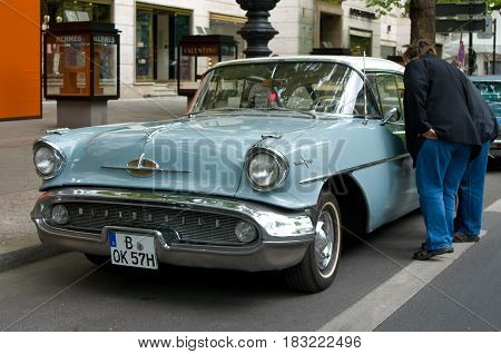 BERLIN - MAY 28: Cars Oldsmobile Holiday 88 the exhibition "125 car history - 125 years of history Kurfurstendamm" May 28 2011 in Berlin Germany