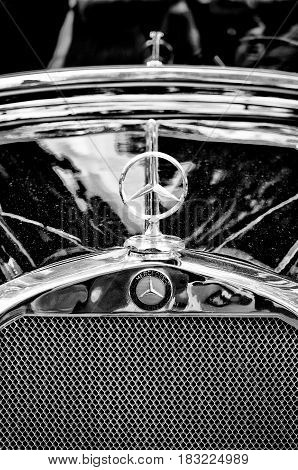 BERLIN - MAY 28: Mercedes-Benz symbol on the hood (Black and White) the exhibition 
