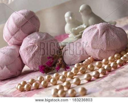 Pink marshmallow on pink cloth. zefir homemade