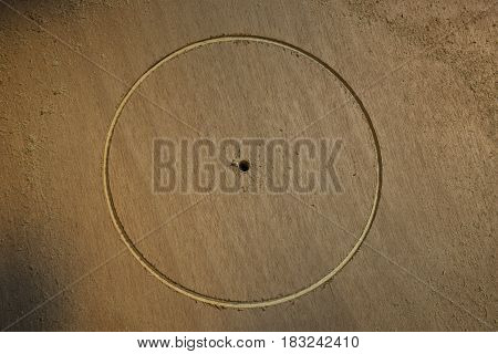 Wooden cornhole board DIY project with circular cut using hole saw