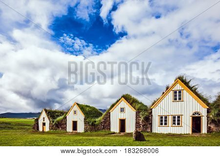 The village of old houses covered with turf and grass. Ethnographic Museum-estate Glaumbaer, Iceland. The concept of the historical and cultural tourism