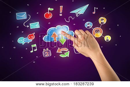 Female hand toucing mixed media icons with purple background