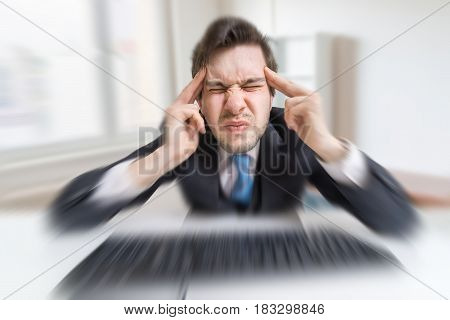 Young Overworked Man Is Tired By Working With Compuiter And Suff