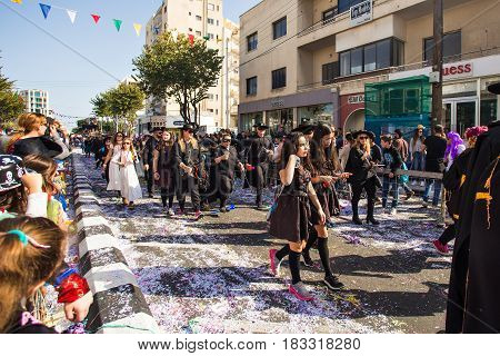 LIMASSOL, CYPRUS - FEBRUARY 26: Grand Carnival Parade - an unidentified people of all ages , gender and nationality in colorful costumes during the street carnival
