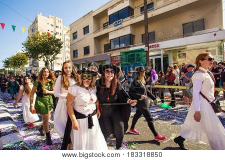 LIMASSOL, CYPRUS - FEBRUARY 26: Grand Carnival Parade - an unidentified people of all ages , gender and nationality in colorful costumes during the street carnival