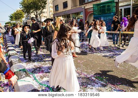 LIMASSOL, CYPRUS - FEBRUARY 26: Grand Carnival Parade - an unidentified people of all ages , gender and nationality in colorful costumes during the street carnival