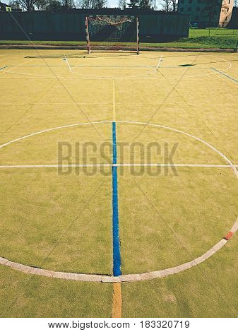 Circle In Middle Of Court. Empty Outdoor Handball Playground, Plastic Light Green Surface