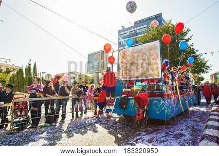 LIMASSOL, CYPRUS - FEBRUARY 26: Grand Carnival Parade - an unidentified people of all ages , gender and nationality in colorful costumes during the street carnival