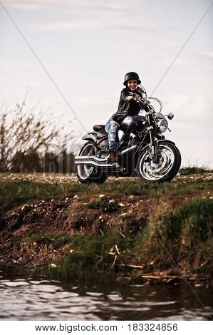 Beautiful Motorcycle Brunette Woman With A Classic Motorcycle (cinema Bleach Bypass Effect)