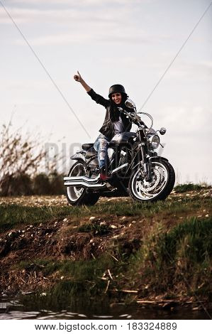 Beautiful Motorcycle Brunette Woman With A Classic Motorcycle (cinema Bleach Bypass Effect)