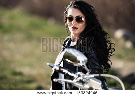 Beautiful Motorcycle Brunette Woman With A Classic Motorcycle (cinema Bleach Bypass Effect)