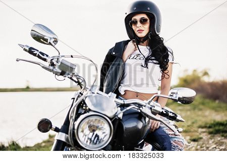 Beautiful Motorcycle Brunette Woman With A Classic Motorcycle (cinema Bleach Bypass Effect)