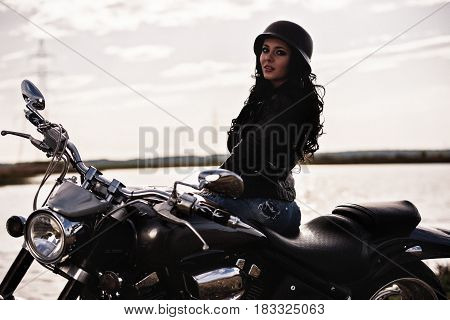 Beautiful Motorcycle Brunette Woman With A Classic Motorcycle (cinema Bleach Bypass Effect)
