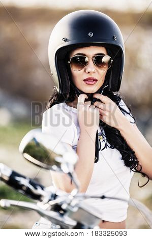 Beautiful Motorcycle Brunette Woman With A Classic Motorcycle (cinema Bleach Bypass Effect)