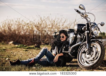 Beautiful Motorcycle Brunette Woman With A Classic Motorcycle (cinema Bleach Bypass Effect)