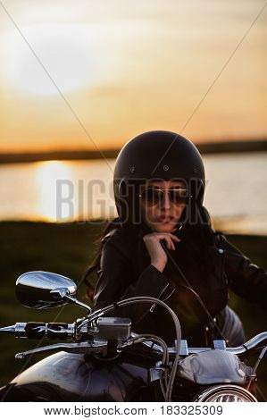 Beautiful Motorcycle Brunette Woman With A Classic Motorcycle (cinema Bleach Bypass Effect)