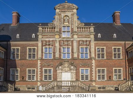 AHAUS, GERMANY - AUGUST 17, 2016: Facade on the cobblestoned courtyard of the Ahaus castle in Germany