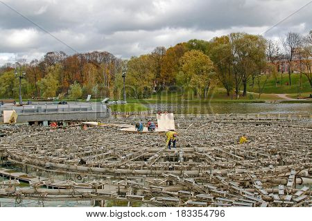 Moscow Russia - October 15 2008: The workers produce the preservation of the fountain for the winter in Tsaritsyno Park in Moscow