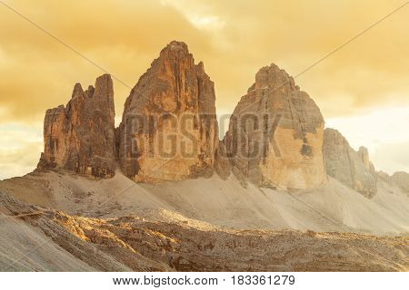 Tre Cime di Lavaredo in beautiful surroundings in the Dolomites at sunset in Italy Europe (Drei Zinnen)