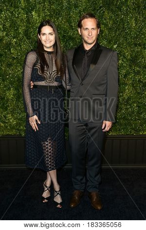 NEW YORK-APR 24: Josh Lucas (R) and Jessica Ciencin Henriquez attend the 12th Annual Tribeca Film Festival Artists Dinner hosted by Chanel at Balthazar Restaurant on April 24, 2017 in New York City.