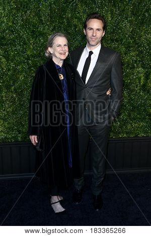 NEW YORK-APR 24: Alessandro Nivola (R) and Virginia Nivola attend the 12th Annual Tribeca Film Festival Artists Dinner hosted by Chanel at Balthazar Restaurant on April 24, 2017 in New York City.