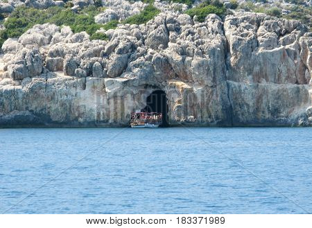 cave view with yachts in the mediterranean sea turkey