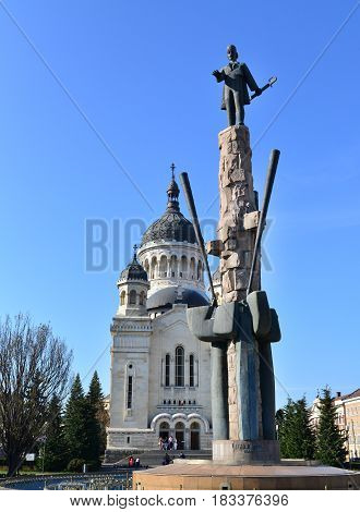 CLUJ NAPOCA ROMANIA - 04.01.2017: Archdiocesan Cathedral and Avram Iancu statue landmark architecture