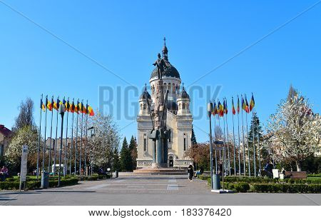 CLUJ NAPOCA ROMANIA - 04.01.2017: Archdiocesan Cathedral and Avram Iancu statue landmark architecture