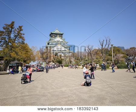 OSAKA CASTLE: OSAKA, JAPAN - APRIL 3, 2017: The Front View of Osaka Castle. This Castle is Very Famous Historic Tourist Attraction of Osaka Japan.