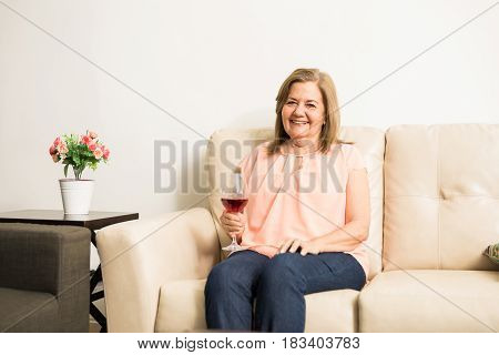 Mature Woman Drinking Wine