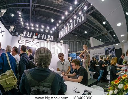 MOSCOW RUSSIA - APRIL 21 2017: Booth of Fujifilm company at PhotoForum 2017 trade show and exhibition in Moscow Russia on April 21 2017.