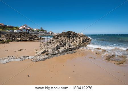 Scenic beach in the touristic village of Comillas Cantabria Spain.