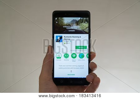 Paris, France, april 22, 2017: Runtastic application on google play store on smartphone