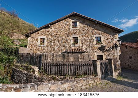 Barcena Mayor village typical stone houses in Cantabria Spain.