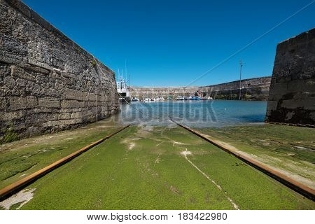 Comillas small fishing port Cantabria Spain .