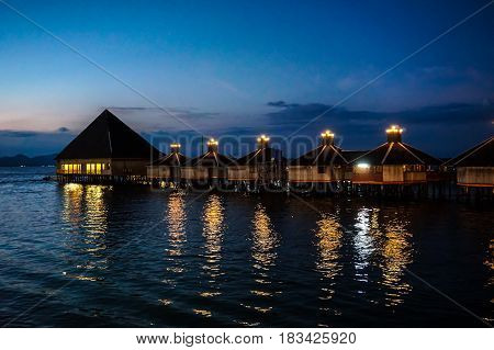 Semporna,Sabah-Apr 21,2017:View of Floating Resort during blue hour sunset at Semporna,Sabah.Semporna is a gateway for diving & snorkeling trips to the islands of Sipadan,Mabul,Mataking,Maiga & others