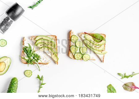 healthy breakfast with sandwiches set on white table background top view mockup
