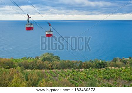 Autumnal landscape with a cable-way to the Black Sea on the Crimean resort shore