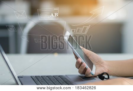 Business woman user using smartphone and laptop for online communication network technology 4.0 internet wireless application mobile with icon web flow Connect to Internet with phone