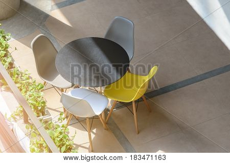 Top View Of Modern Table And Chairs