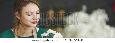Florist Holding Flowers