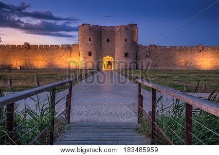 Sunset over the wall in old city Aigues-Mortes, Provence, France.