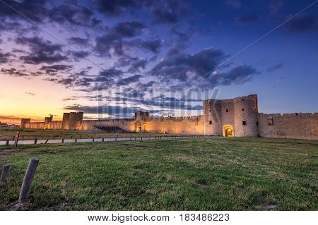 Sunset over the wall in old city Aigues-Mortes, Provence, France.