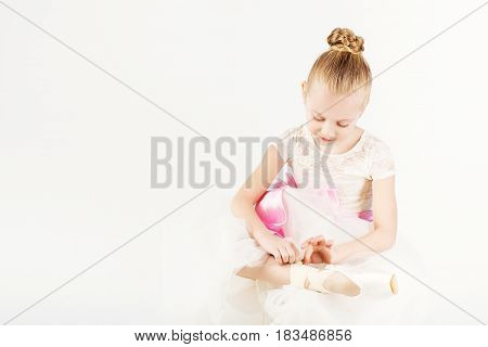 Beautiful Ballet Dancer Isolated On White Background.