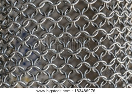 Texture of chainmail of a medieval armor knight, Pattern, background, closeup, detail