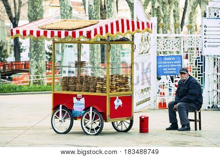 ISTANBUL, TURKEY - 1 APRIL , 2017:Street sales of traditional Turkish bagels Simit, are on the streets of Istanbul in Turkey